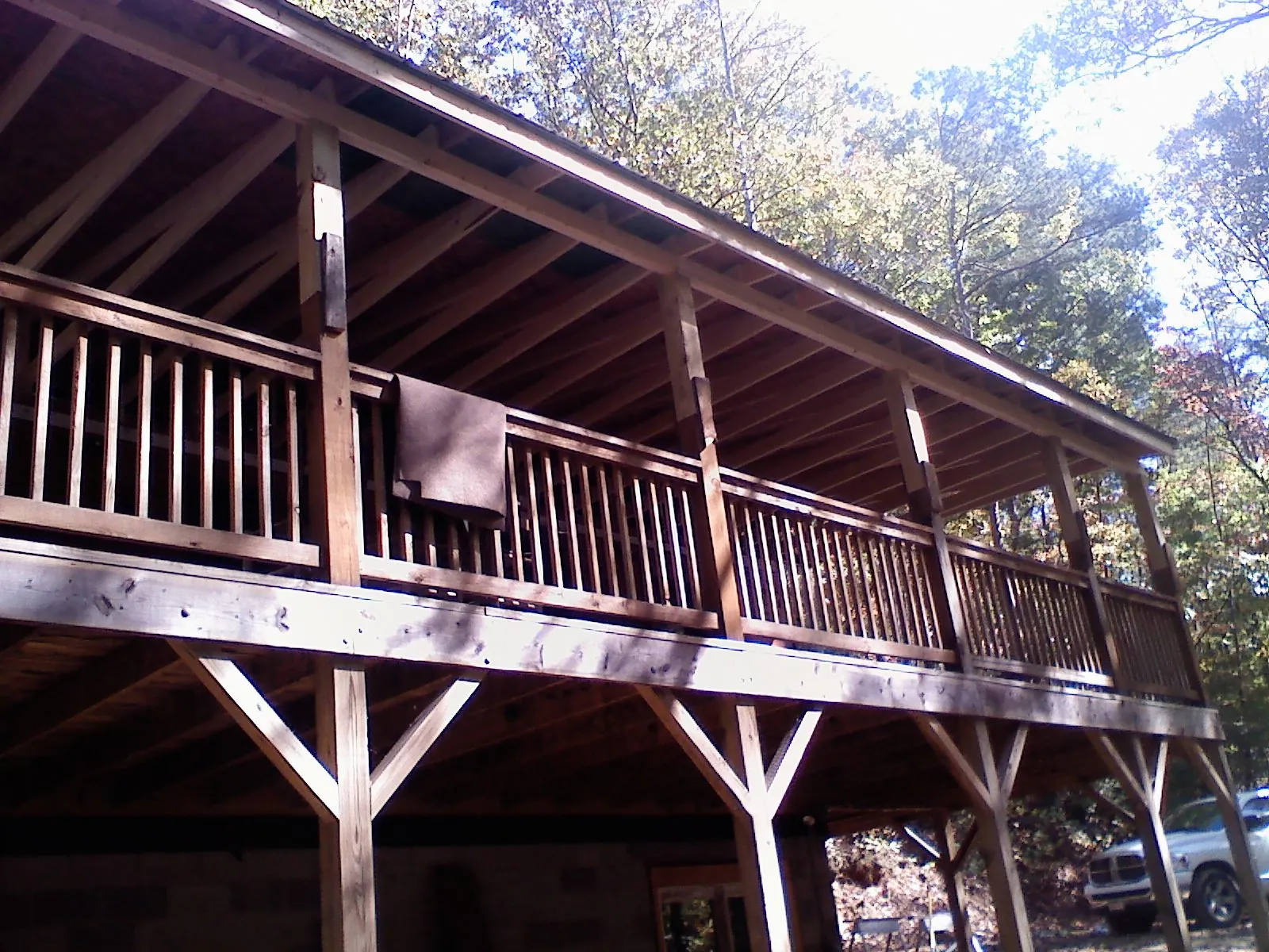 Timber framing under a new elevated porch and deck — Roof Leak Repair in Apple River by Roofing Brothers